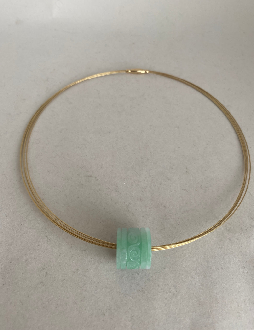 CARVED APPLE GREEN JADEITE JADE PENDANT