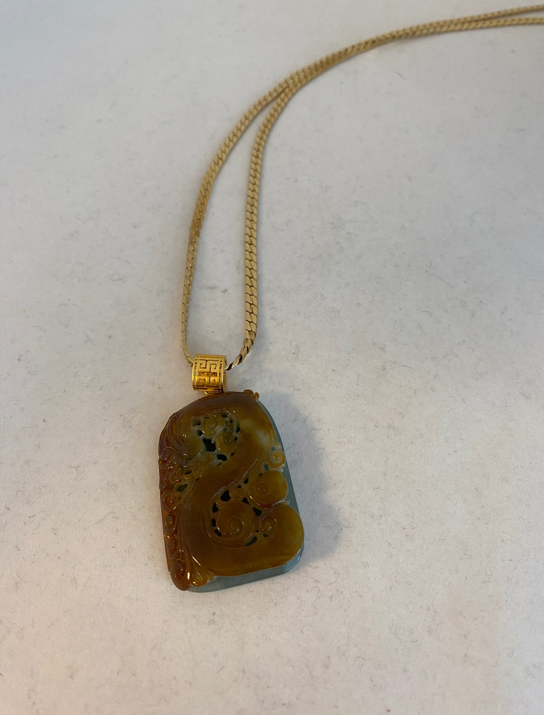 18K CARVED DEEP BUTTERSCOTCH JADE PENDANT