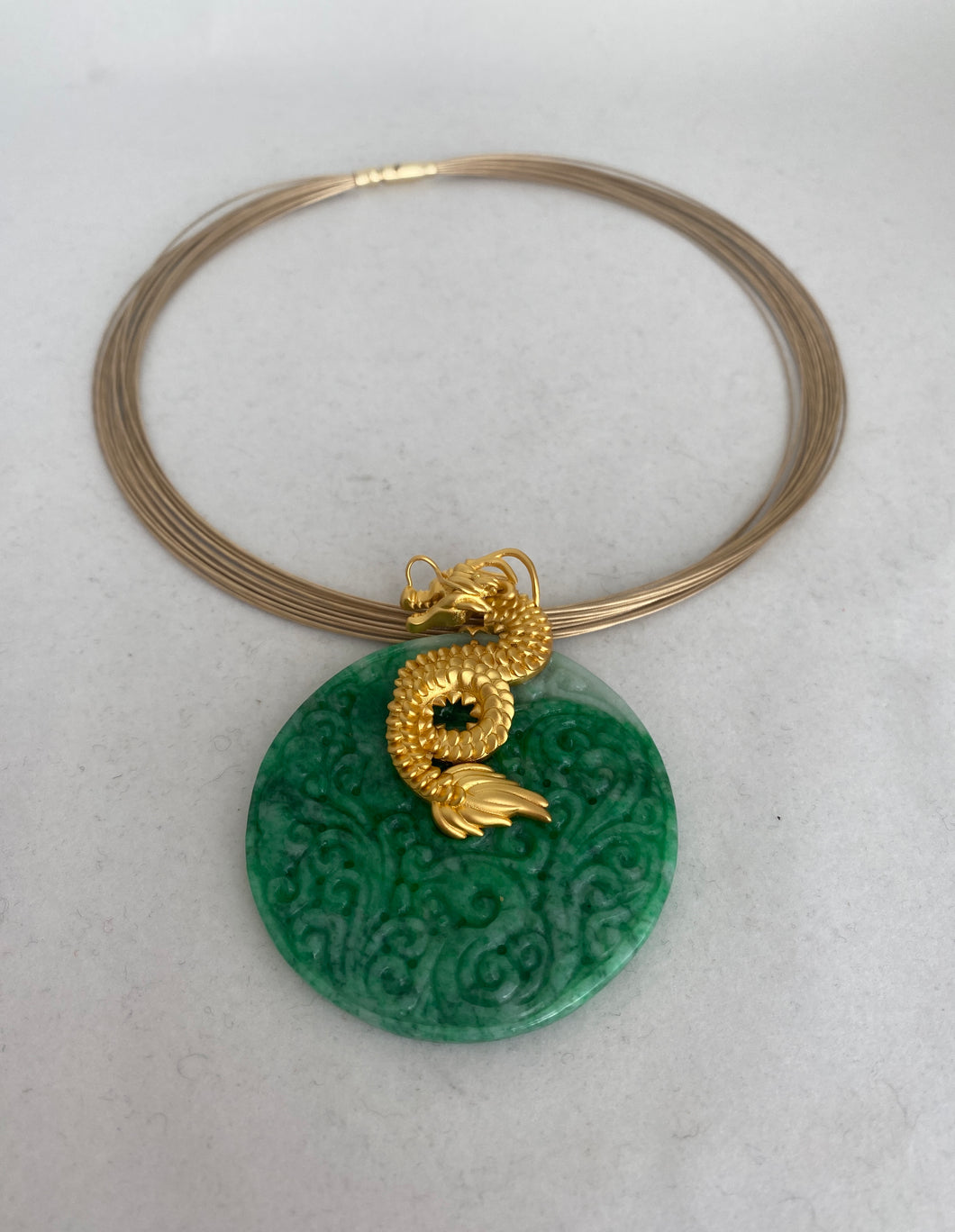 18K CARVED GREEN JADE MEDALLION WITH GOLD DRAGON