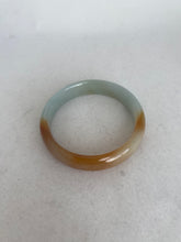 Load image into Gallery viewer, TRANSLUCENT LIGHT GREEN WITH BUTTERSCOTCH JADEITE JADE BANGLE
