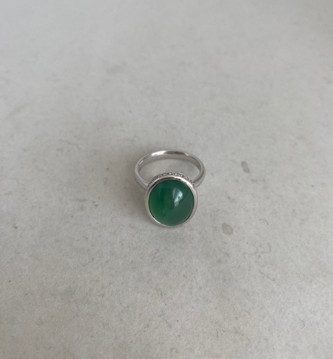PLATINUM DEEP SPRING GREEN JADEITE JADE RING 16X12MM WITH DIAMONDS HALO DETAIL.
