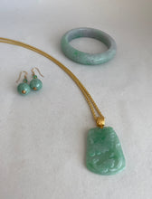 Load image into Gallery viewer, 18K TRANSLUCENT APPLE GREEN JADEITE JADE PENDANT DEPICTING LOTUS AND FISH.

