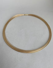 Load image into Gallery viewer, 14K 21 STRNDS GOLD NECK WIRE
