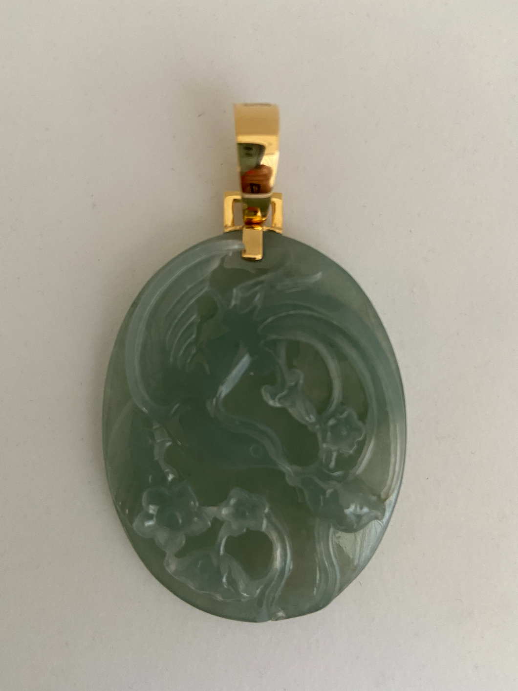 18K TRANSLUCENT OCEAN GREEN CARVED JADE PENDANT