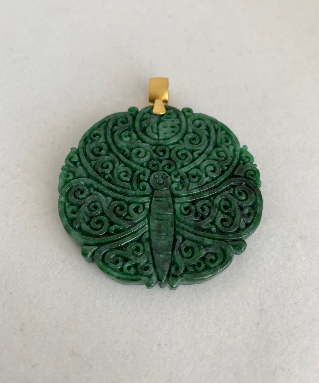 18K DARK GREEN JADEITE JADE MEDALLION WITH CARVED BUTTERFLY