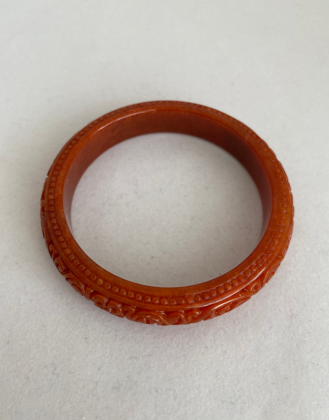 CARVED RED JADEITE JADE BANGLE