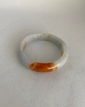 Load image into Gallery viewer, WHITE JADEITE JADE BANGLE WITH A BRIGHT ORANGE RED ( KOI). 57.5MM.
